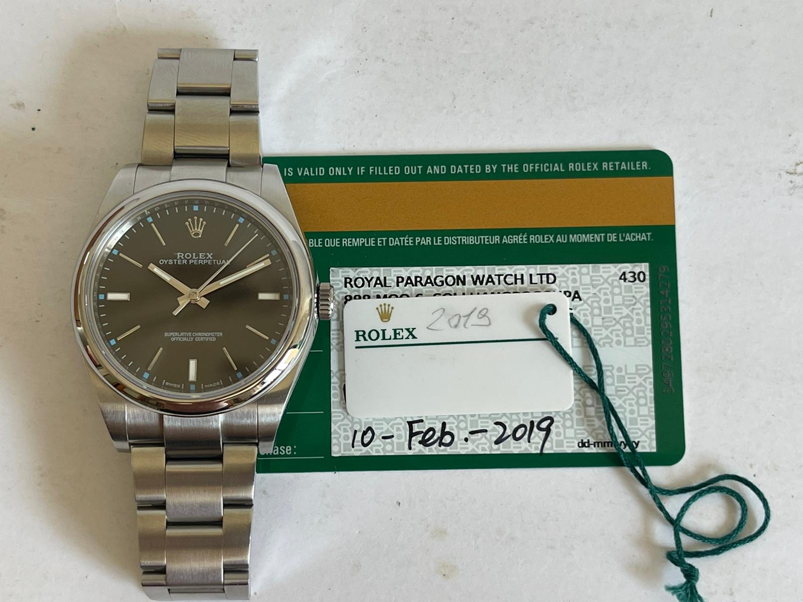 Rolex Oyster Perpetual Oyster Perpetual 114300 Dark Rhodium Dial 39 mm only card no box 2019 very good condition | San Giorgio a Cremano
