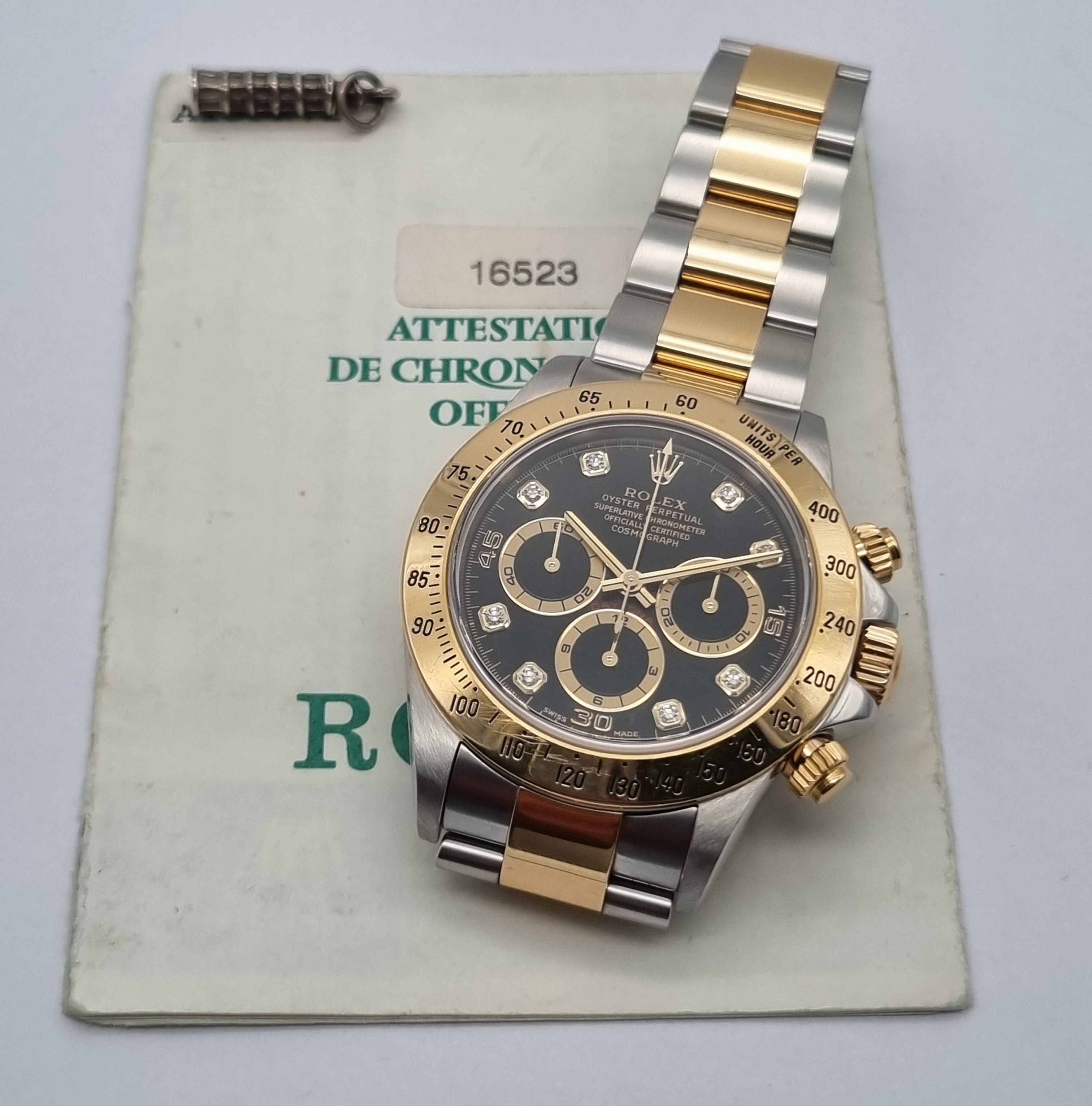 Rolex Daytona Daytona A-Serial (Last-Serial) 16523 Steel And 18 Kt YG Black Diamonds Dial Full Set 1999  | San Giorgio a Cremano